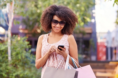 Woman shopping on phone.jpeg